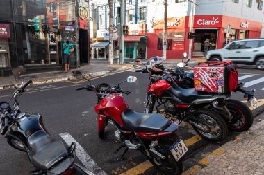 Marilia, Sao Paulo, Brazil, July 27, 2022. Reserved parking spaces for motorcycles on Nove de Julho street, downtown Marilia