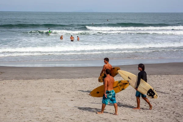 Sao Sebastiao, Sao Paulo, Brazil, May 17, 2015. Surfer with his board prepares his entry into the sea at Cambury beach in Sao Sebastiao, north coast of the State of Sao Paulo.