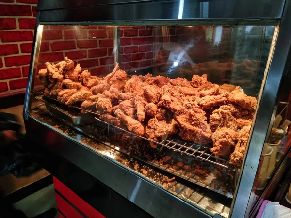 Ready-to-eat fried chicken at one of the fast-food shops