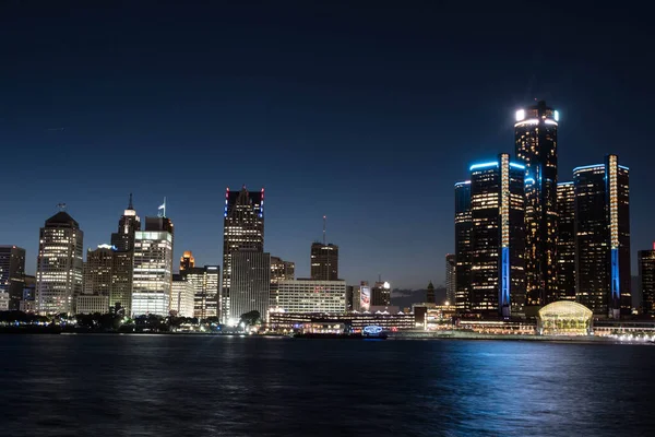 View of the skyline of Downtown Detroit, Michigan from across the Detroit river at the Windsor, Ontario riverfront at night