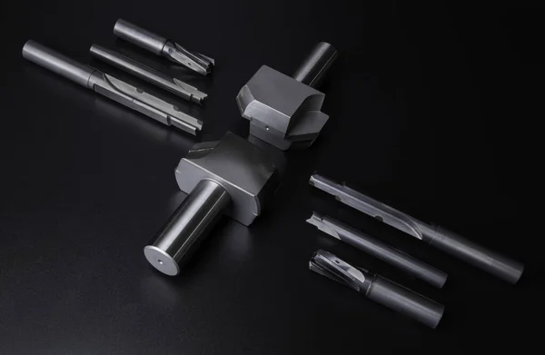 pcd reamer boring,drill cutting tool special set. material Carbide-k10 brazing welding diamond. shank steel sncm439. Isolated on dark background.