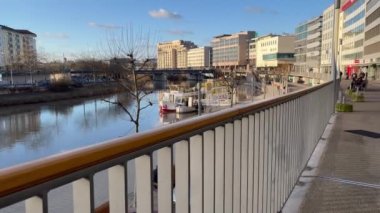 Riverwalk at River Saar in the city of Saarbruecken - SAARBRUECKEN, GERMANY - JANUARY 10, 2022