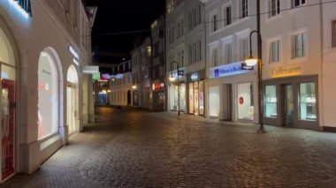Pedestrian zone in the historic district of Saarbruecken at night - SAARBRUECKEN, GERMANY - JANUARY 11, 2022