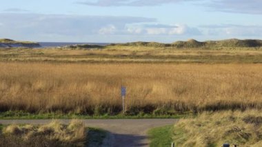 St. Peter Ording Almanya 'daki kum tepeleri ve Wadden Denizi - seyahat fotoğrafçılığı