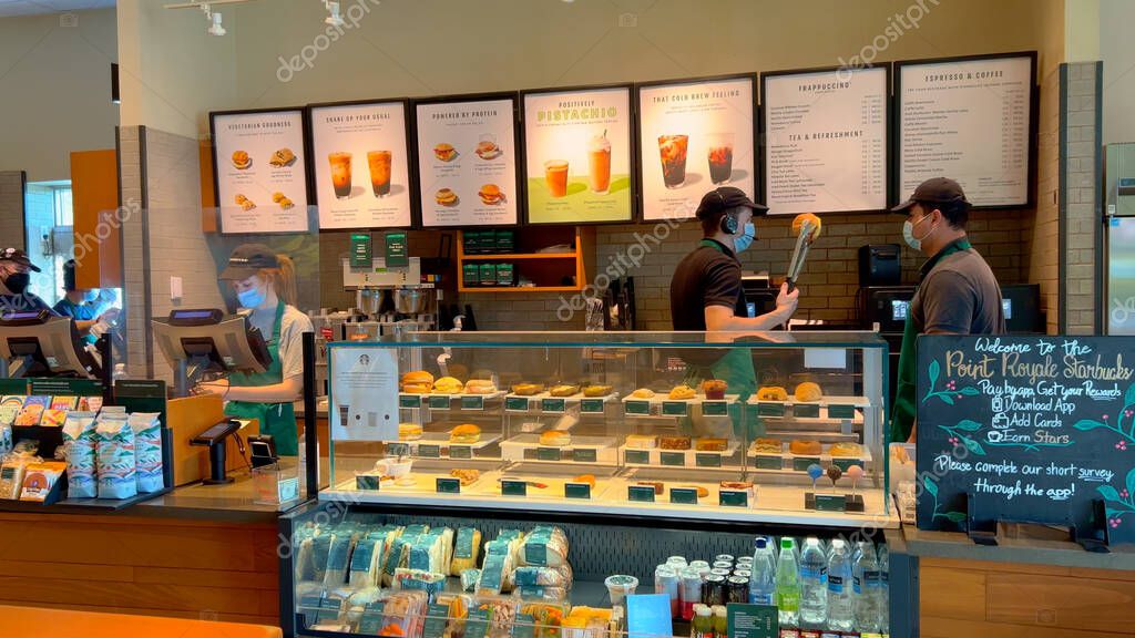 Starbucks Cafe is a popular place to relax and have breakfast coffee - MIAMI, FLORIDA - FEBRUARY 20, 2022
