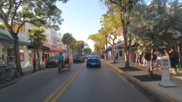 POV Drive through Duval Street on Key West - KEY WEST, FLORIDA - FEBRUARY 15, 2022 — 图库视频影像