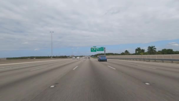 POV Drive over the Highway with street sign Miami - MIAMI, FLORIDA - FEBRUARY 15, 2022 — стокове відео
