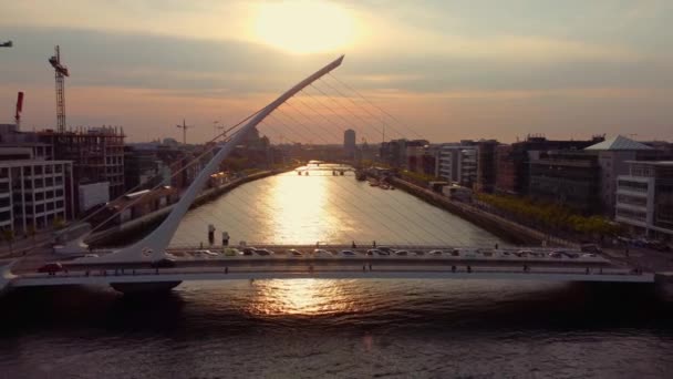 River Liffey in the city of Dublin - aerial view in the evening — Stockvideo