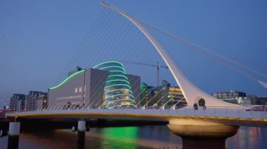 Samuel Beckett Bridge over River Liffey in Dublin - evening view - DUBLIN, IRELAND - APRIL 20, 2022
