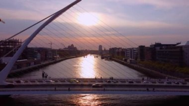 Samuel Beckett Bridge over River Liffey in Dublin - aerial view by drone