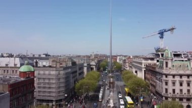 Famous O Connell Street with Spire in Dublin from above - aerial view by drone