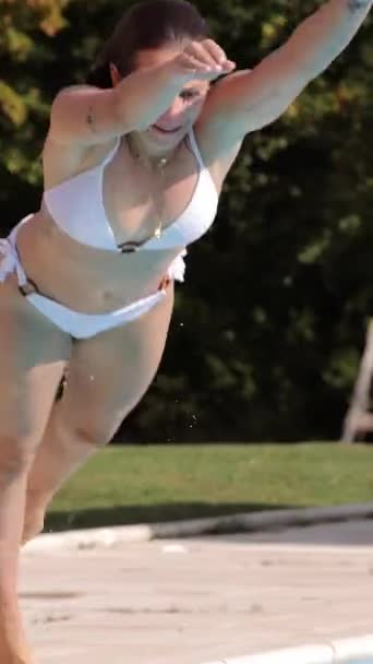 Sexy Girl Bikini Jumps Swimming Pool Slow Motion Sunny Day — Stockvideo