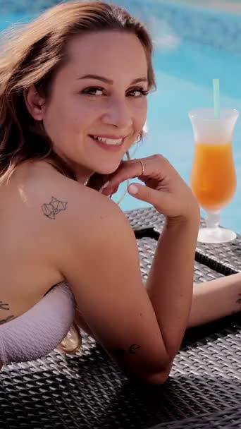 Sexy Woman Bikini Sunbathing Swimming Pool Summer Vertical Video — Stockvideo