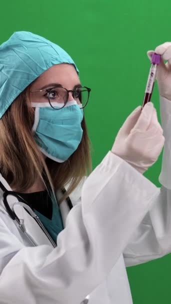 Female Doctor Examines Blood Sample Studio Photography Vertical Video — Wideo stockowe