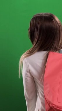 Young pretty woman with shopping bags on shopping tour - studio photography - Vertical video