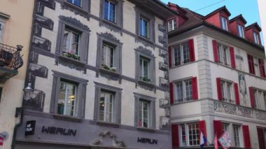 Historic buildings in the Old Town of Lucerne - LUCERNE, SWITZERLAND - JULY 14, 2022