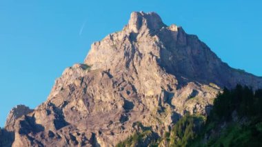 Beautiful mountain peak in Switzerland at sunset