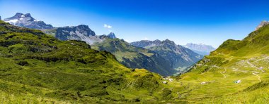 Panoramic view over the mountains from Klausen Pass in Switzerland - travel photography
