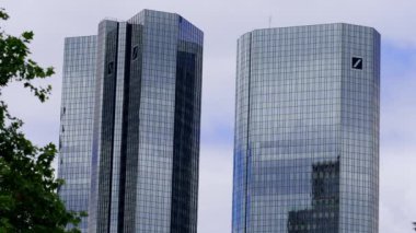 Deutsche Bank towers in the financial district in the city of Frankfurt - FRANKFURT MAIN, GERMANY - JULY 12, 2022