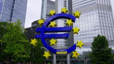 Giant Euro symbol at the Euro Tower in Frankfurt - FRANKFURT MAIN, GERMANY - JULY 12, 2022
