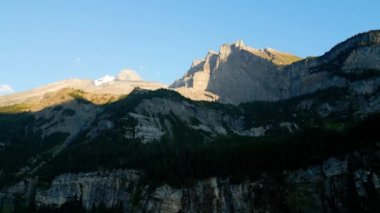 The high mountains of the Swiss Alps at sunset - travel photography