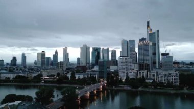 Skyline of Frankfurt Germany with its Financial district in the evening - CITY OF FRANKFURT, GERMANY - JULY 10, 2022