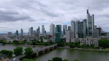 Skyline of Frankfurt Germany with its Financial district in the evening - CITY OF FRANKFURT, GERMANY - JULY 10, 2022