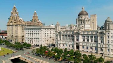 Aerial view over the Three Graces at Pier Head in Liverpool - drone photography