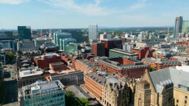 Aerial view over the city center of Manchester - MANCHESTER, UNITED KINGDOM - AUGUST 15, 2022