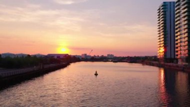 Beautiful sunset at Media City UK in Manchester - MANCHESTER, UNITED KINGDOM - AUGUST 15, 2022