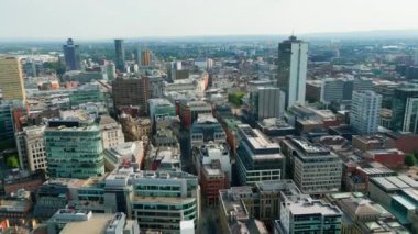 Flight over the city centre of Manchester - aerial view - MANCHESTER, UNITED KINGDOM - AUGUST 15, 2022