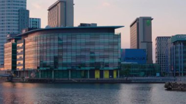 Media City UK in Manchester at sunset - MANCHESTER, UNITED KINGDOM - AUGUST 15, 2022
