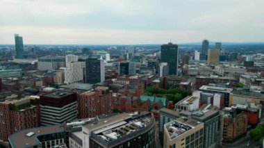 Aerial view over the city centre of Manchester - MANCHESTER, UNITED KINGDOM - AUGUST 15, 2022