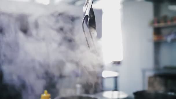 Cooking. steaming food. buffet restaurant kitchen. Close-up. food is steamming, boiling in the pan. Preparing and cooking food in a commercial kitchen. — Stock Video