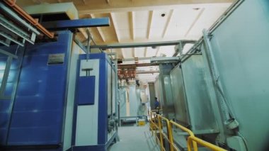 CHERKASSY, UKRAINE, JULY 19, 2022: paint workshop. Industrial painting. empty production workshop at the factory