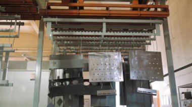 paint workshop. Industrial painting. painting in production workshop. at the factory. Painting top coat of steel structures or metal products at industrial factory