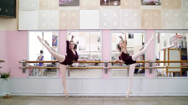 Dancing Hall Young Ballerinas Purple Leotards Perform Grand Battement Back — Stockfoto