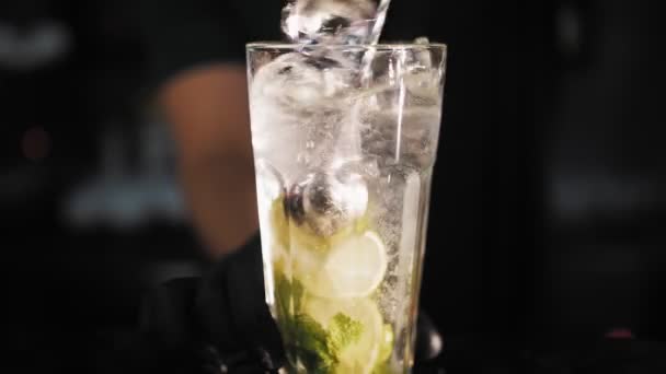 Making Cocktail Close Bartender Mixes All Ingredients Ice Cubes Tall — Stock Video
