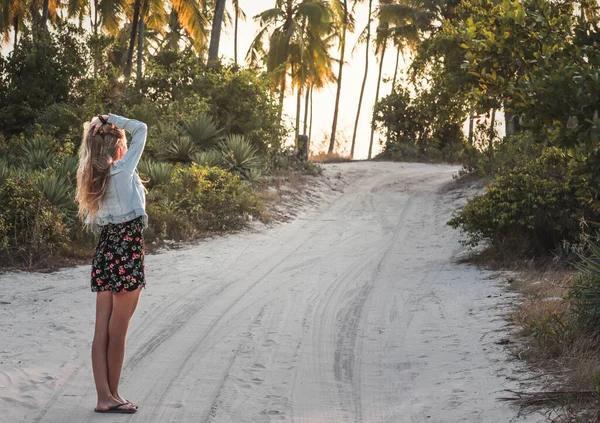 Blonde Woman Standing Backwards Jeans Jacket Magic Sunset Tropic Road — Stock Photo, Image