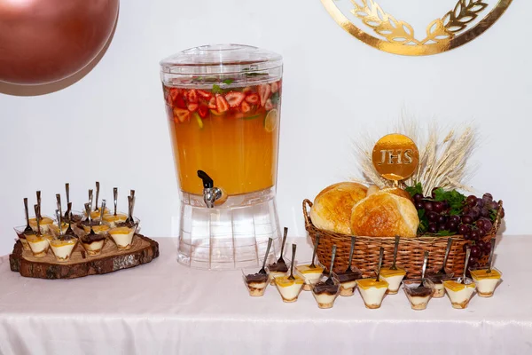 Social Events - Table With Desserts And Drink Dispenser For Guests