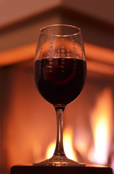 Glass Red Wine Fireplace Background — Stock Photo, Image