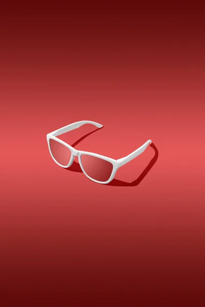 赤のグラデーションの背景を持つ赤いサングラスの3Dレンダリング スタジオショット — ストック写真