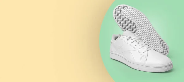 Banner New Pair White Sneakers Isolated Light Yellow Green Background — Stock Photo, Image