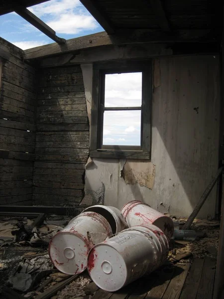 Four White Buckets in an Abandoned Building in Separ, New Mexico. High quality photo