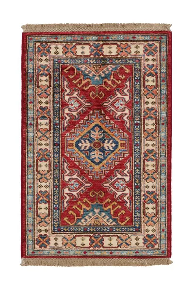 Arka planda el yapımı Afgan halısı var.