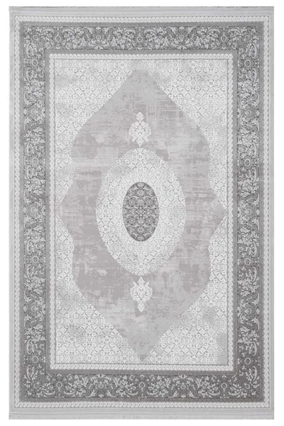 classic patterned machine rug on a white background