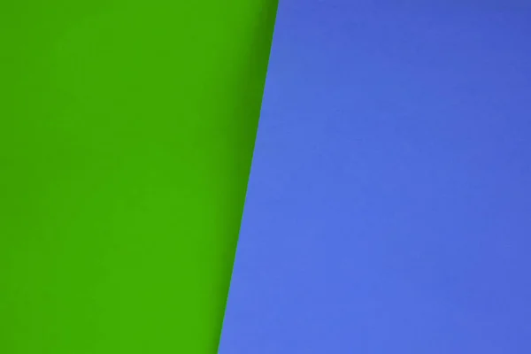 Dark vs light abstract Background with plain subtle smooth de saturated blue green colours parted into two