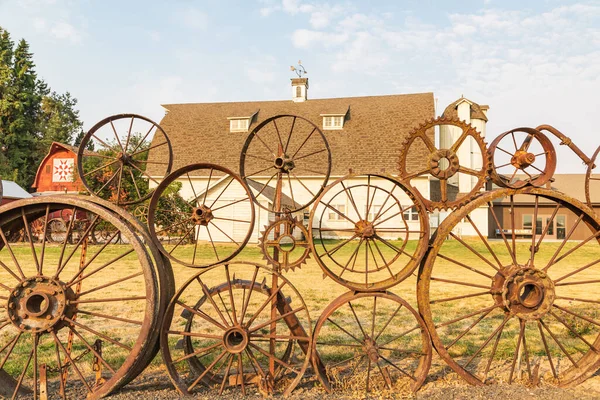 USA, Washington State, Whitman County. Palouse. N. Parkway. September 8, 2021. Fence made from old Iron wheels.