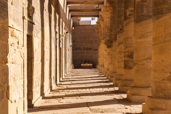 Agilkia Island, Aswan, Egypt. Shadows between columns at Philae Temple, a UNESCO World Heritage Site.