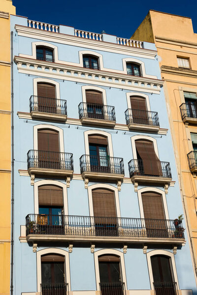 Old building facade and balconies. Tarragona, Spain